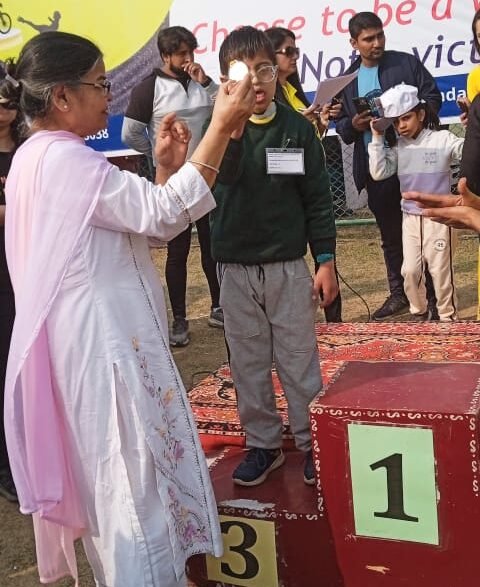 Manas took part in sport competition and he received silver medal and he was very happy.